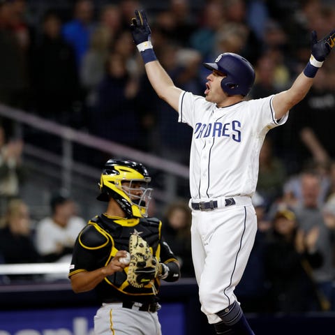 San Diego Padres' Ian Kinsler celebrates after...