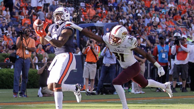 Auburn receiver Nate Craig-Myers (3) makes a touchdown catch as ULM safety Aaron Townsend (31) defends during the third quarter at Jordan Hare Stadium.