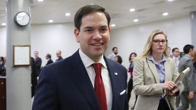 Florida Sen. Marco Rubio  walks to the Senate Chamber for a vote February 7, 2017 in Washington, D.C. Rubio was one of six senators to introduce legislation that would require congressional approval before easing sanctions on Russia.