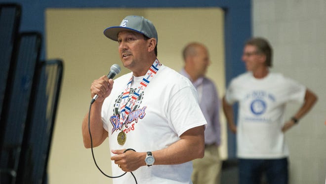 Alex Lopez, Las Cruces High School Softball Coach, speaks during a celebration for the teams state title, Tuesday May 15, 2018.