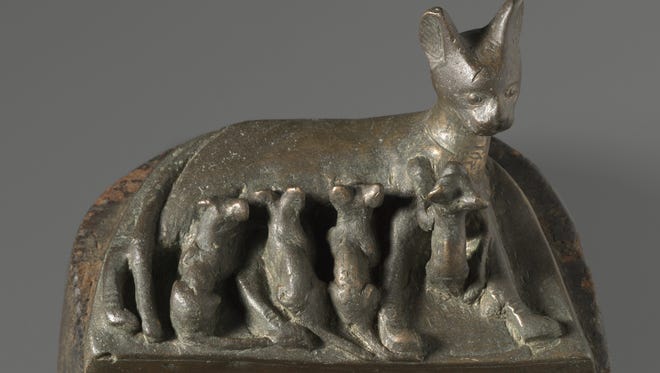 This bronze and wood work Cat with Kittens is part of the "Divine Felines" exhibit at the McClung Museum.  The exhibition is organized by the Brooklyn Museum.