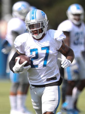 Lions safety Glover Quin runs the ball during practice Tuesday, August 1, 2017 in Allen Park.