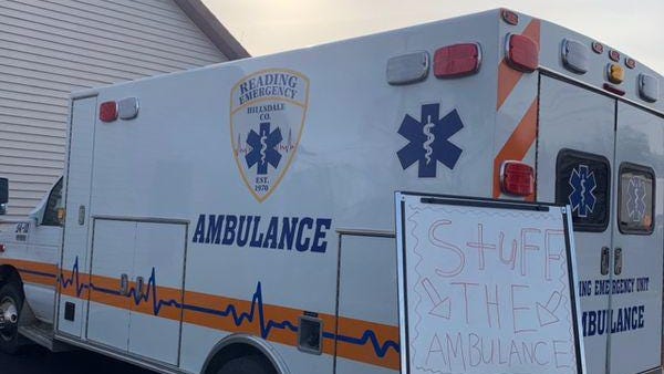 An ambulance outside Reading Emergency Unit's headquarters sits in idle ready for non-perishable food item donations to benefit area food pantries.