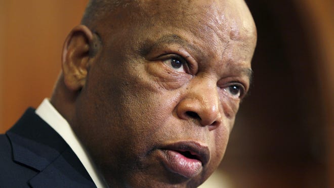 Rep. John Lewis, D-Ga., participates in a  ceremony to unveil two plaques recognizing the contributions of enslaved African Americans in the construction of the United States Capitol, Wednesday, June 16, 2010, on Capitol Hill in Washington.
