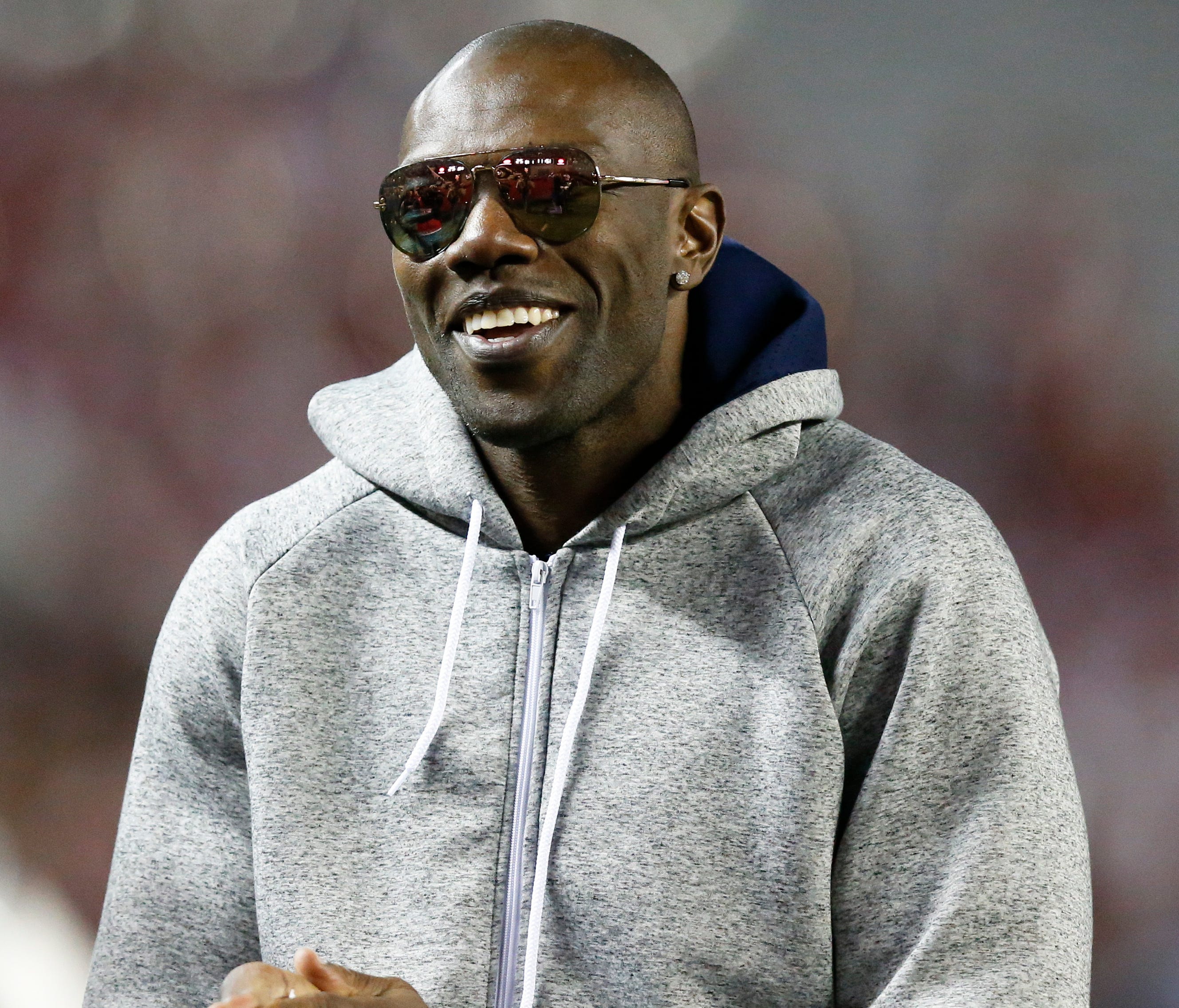 FILE - In this Nov. 19, 2016, file photo, former NFL wide receiver and Chattanooga alum Terrell Owens walks the sidelines during the second half of an NCAA college football game between Alabama and Chattanooga, in Tuscaloosa, Ala. Terrell Owens says 