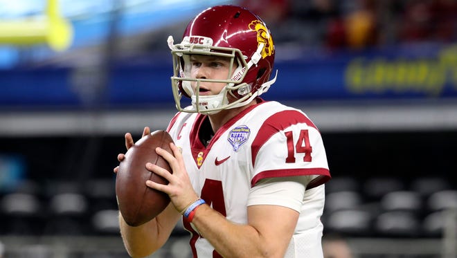USC Trojans quarterback Sam Darnold (14) throws before the game against the Ohio State Buckeyes in the 2017 Cotton Bowl at AT&T Stadium.