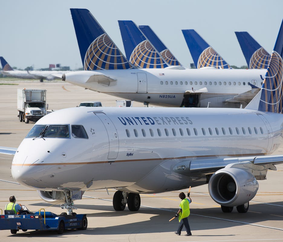 This file photo from June 2015 shows a United Express Embraer E170 jet preparing for departure at Chicago's O'Hare International Airport.