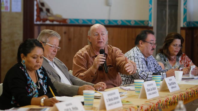 State Sen. Cisco McSorley, D-Albuquerque, center, talks about a report on tribal food policies during an Indian Affairs Committee meeting on Tuesday at the Tooh Haltsooí Chapter house in Sheep Springs.