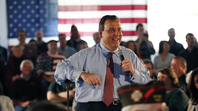New Jersey Gov. Chris Christie listens to a question during a campaign event Sunday in Hampton, N.H.