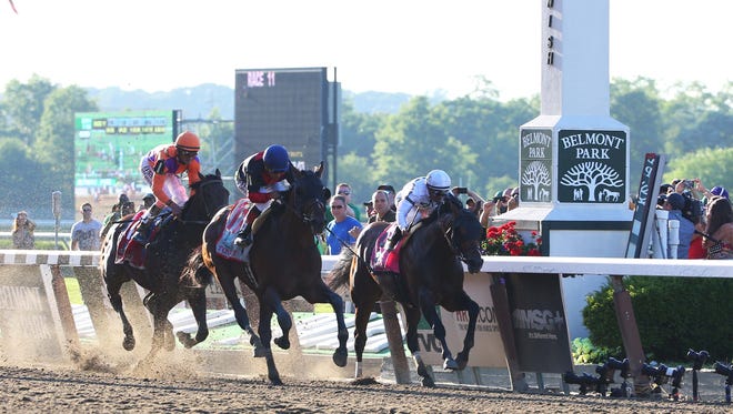 Joel Rosario aboard Tonalist (11) wins the 2014 Belmont Stakes at Belmont Park. On Saturday the colt tries to win the $5 million Breeders' Cup Classic.