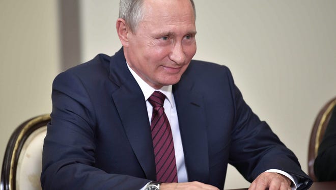 Russian President Vladimir Putin is seen.