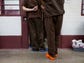 Mesa inmates line up for lunch at CoreCivic Florence