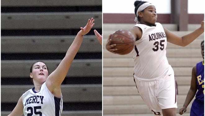Mercy junior Katie Titus, left, and Aquinas junior Kayla Jackson will square off Friday night at 7:30 p.m. when the Private-Parochial League rivals clash in a rare No. 1 vs. No. 1 meeting of teams ranked in the Democrat and Chronicle girls basketball polls.