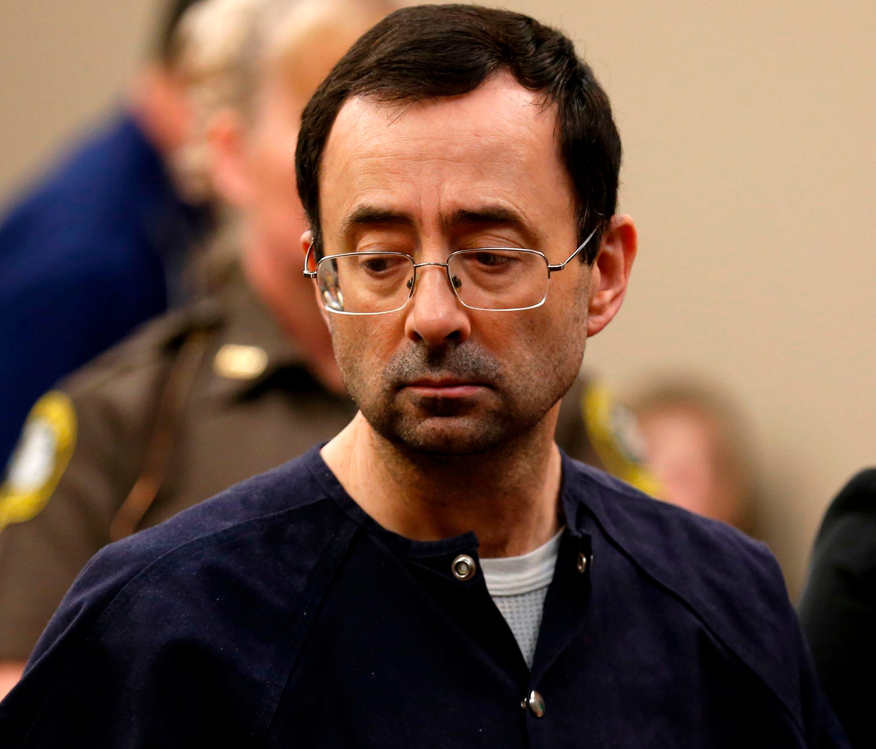 Former  Michigan State University and USA Gymnastics doctor Larry Nassar is pictured addressing the court during the sentencing phase in Ingham County Circuit Court in Lansing, Mich.