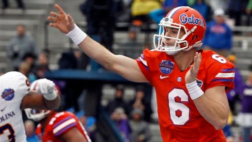 Florida quarterback Jeff Driskel (6) throws a pass during the first half of the Birmingham Bowl NCAA college football game against East Carolina, Saturday, Jan. 3, 2015, in Birmingham, Ala. (AP Photo/Butch Dill)