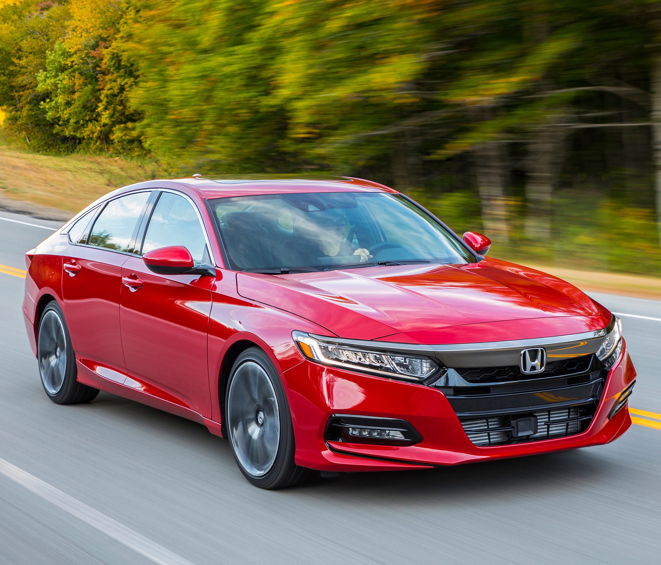 This photo provided by Honda shows the 2018 Honda Accord, a midsize sedan that's available with a manual transmission. The Accord makes an excellent family car, and the manual transmission provides an added level of driver engagement.