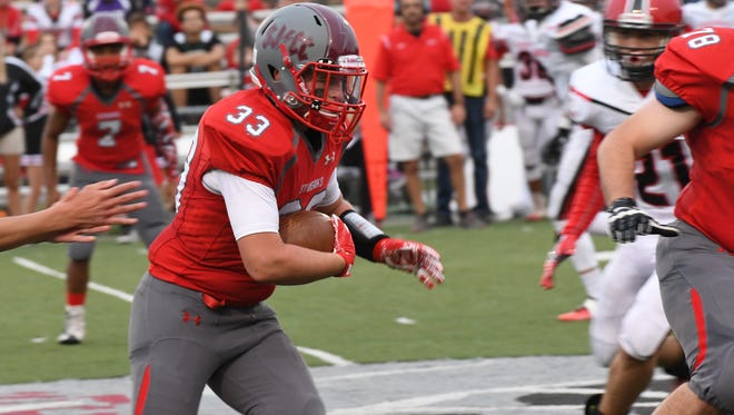 SJCC's Ross Snyder rushed for 102 yards Saturday against Cardinal Stritch.