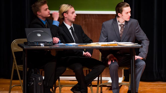 The Defense team takes in the prosecution’s questions in Simon Kenton’s production of “Witness for the Prosecution.”