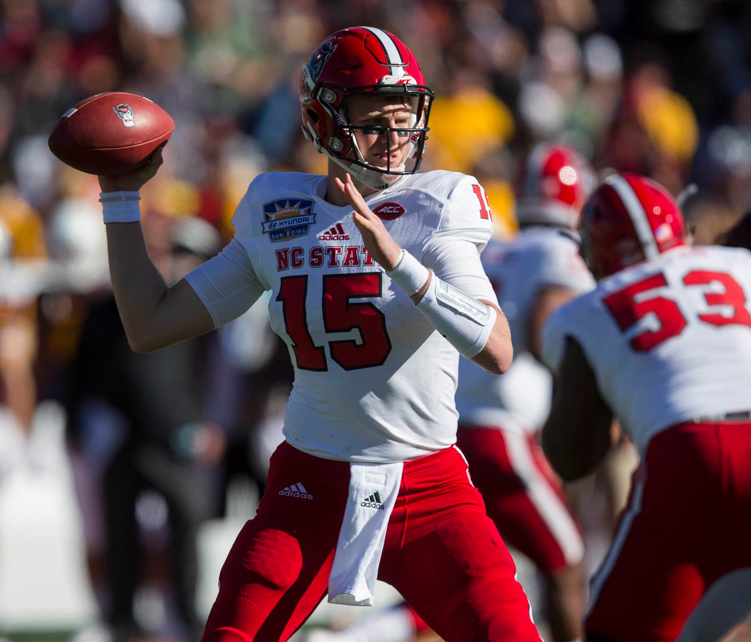North Carolina State quarterback Ryan Finley  drops back to throw the ball against Arizona State in the 2017 Sun Bowl.
