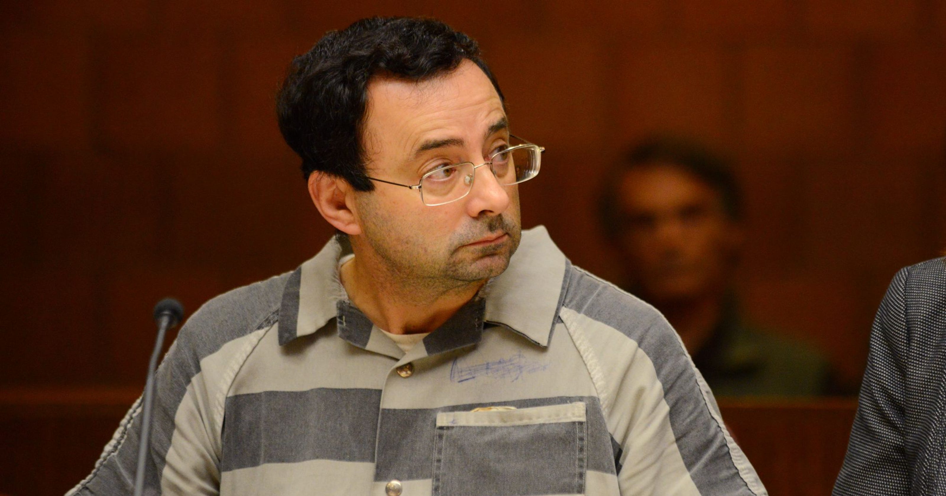 Larry Nassar agrees to plead guilty to federal child ...