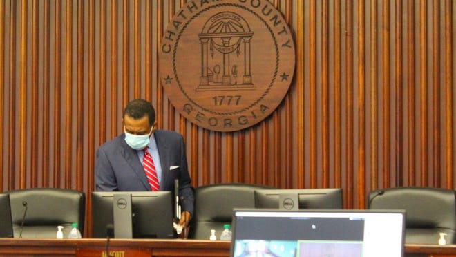 Chatham Commission Chairman Al Scott wears a face mask when arriving for a May 22 meeting at Savannah's Old Courthouse.
