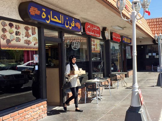 A customer exits a Lebanese eatery in Anaheim's 