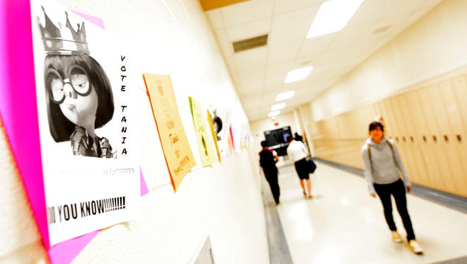 On The Brink - Posters for Tania for Prom Queen line Students walk the halls at York City's William Penn Senior High School in this file photo. (John A. Pavoncello - jpavoncello@yorkdispatch.com