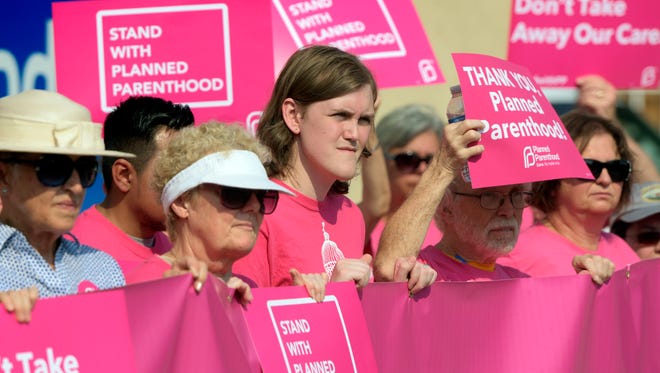 In this file photo, about 50 people rally in support of Planned Parenthood at its Central PA branch in York City Thursday, Sept. 3, 2015. Bill Kalina - bkalina@yorkdispatch.com