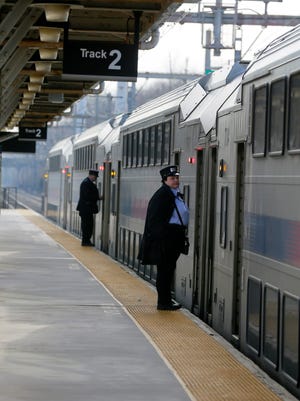 NJ Transit train stops to pick up and drop off passengers at the Aberdeen-Matawan train station in Matawan, NJ Tuesday March 1, 2016.