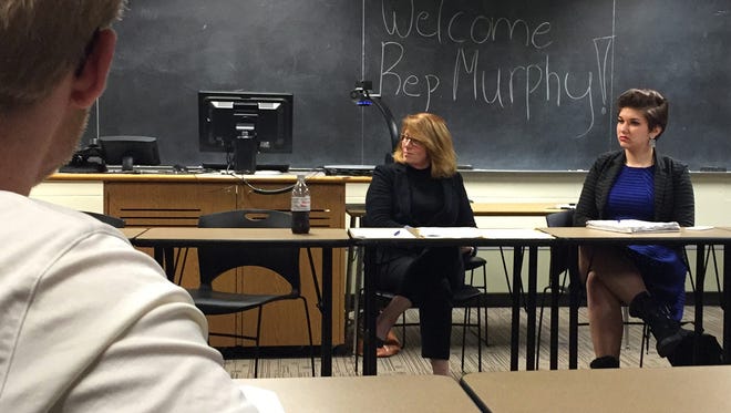 Rep. Erin Murphy, DFL-St. Paul, center, listens to students discuss sexual violence policies during a visit Wednesday to St. Cloud State University.
