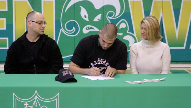 Newark Catholic's Nick Cavinee signed a letter of intent Wednesday to play football at Eastern Kentucky.