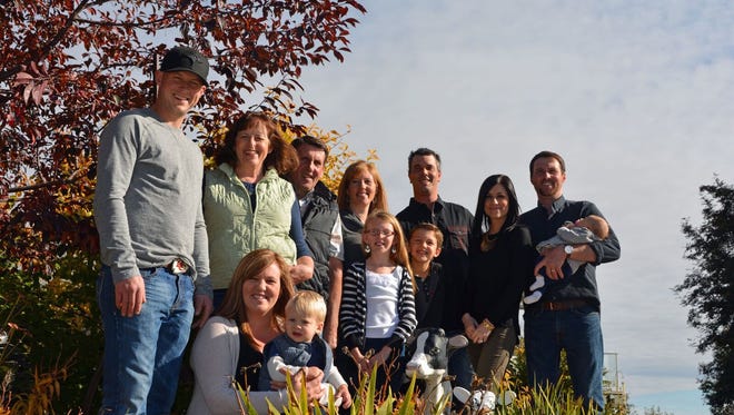 The entire Chalack Family keeps Wendon Holsteins running smoothly (from left) Scott Hastie with his wife, Jillian, and son, Marshall, (kneeling in the foreground) Wendy and Don Chalack; Linsey and Shawn Whalen, with children Paige and Nathan standing in front; Charity and Logan Chalack, who is holding daughter Chloe. Since this family picture was taken in 2015, Maddyn Hastie was born on July 5, 2016.