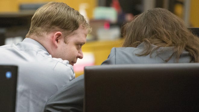John Allen talks to his defense attorney, Gary Beren, before being sentenced to death in Maricopa County Superior Court on Nov. 16, 2017. Allen was sentenced to death for the 2011 murder of 10-year-old Ame Deal.
