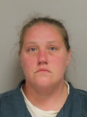 Cherith Yoder, 37, is accused of starting a fire in a mobile home that destroyed the residence.