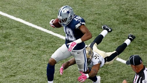 Dallas Cowboys wide receiver Brice Butler (19) pulls in a long pass play in front of New Orleans Saints cornerback Brandon Browner (39) in their game last season.