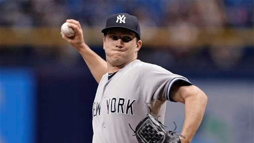 New York Yankees starting pitcher Adam Warren delivers to the Tampa Bay Rays during the first inning of a baseball game Tuesday, Sept. 15, 2015, in St. Petersburg, Fla.