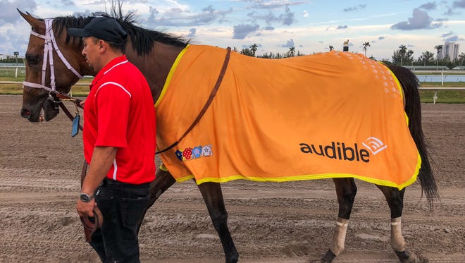An Audible.com logo is in include on Kentucky Derby horse Audible's blanket.
