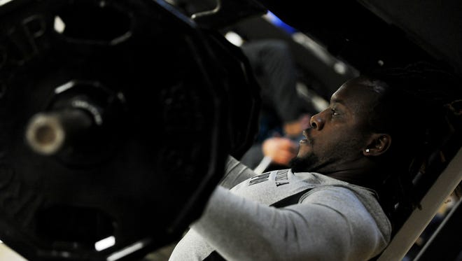 Former Southern Miss track athlete and former Jones County Junior College football player Jamal Young bench presses at Southern Miss’ pro day earlier this month.