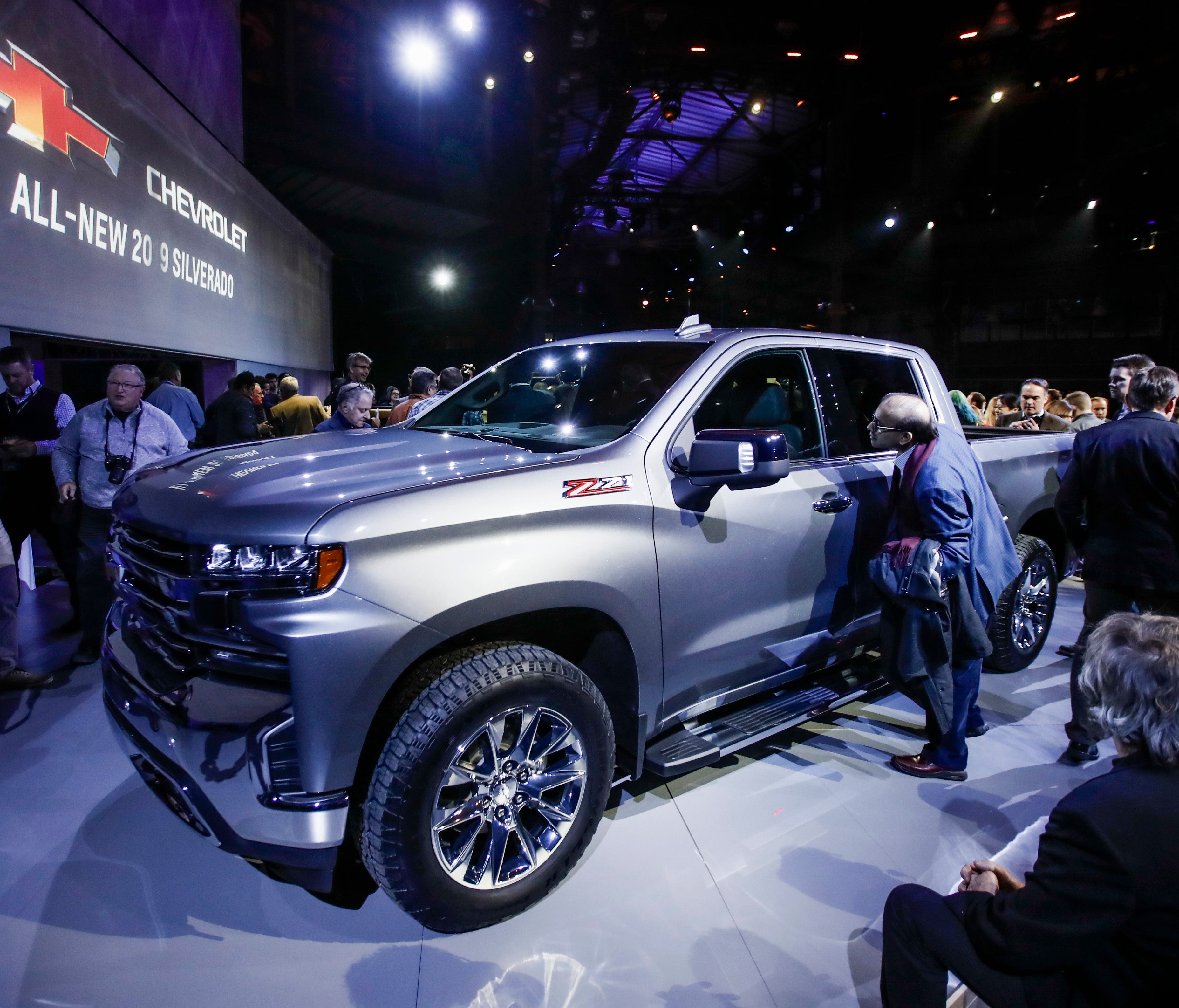 Media and guests attend a special presentation of the 2018 Chevrolet Silverado pickup truck as part of the media preview at the 2018 North American International Auto Show in Detroit, Michigan on Jan. 13, 2018. The automobile show opens to the public