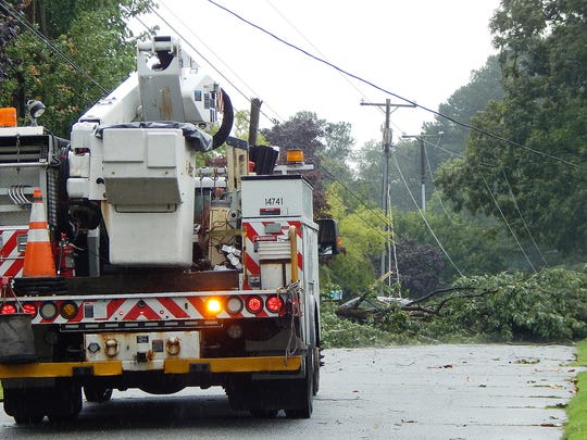 Straight-line wind from a severe thunderstorm blew down trees and a power pole on Dutch Road and damaged the roof of a home on Salisbury Street in Seabreeze, a development north of Dewey Beach, on July 27, 2018.