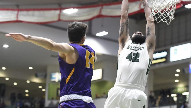 Binghamton University's Willie Rodriguez looks to dunk against Elmira College on Saturday at the Binghamton University Events Center.