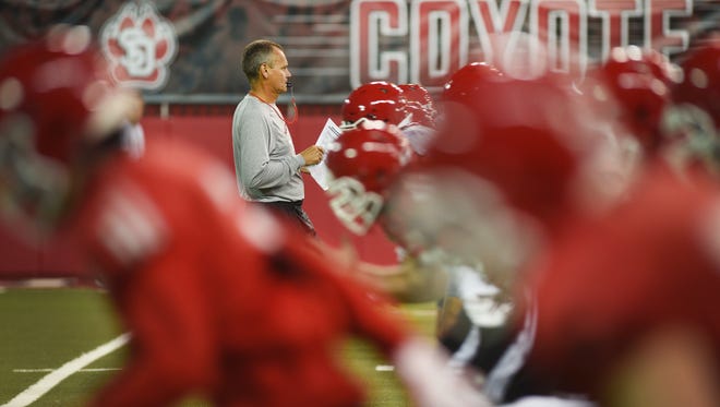 USD head coach Bob Nielson during practice after media day Thursday, Aug 9, at the DakotaDome in Vermillion.