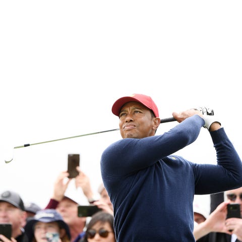 Captain Tiger Woods practices ahead of the 2019 Pr