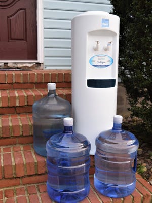 In early December, residents along Jersey Road near Millsboro discovered a water system on their front steps and porches. The supplies, delivered on behalf of Mountaire Farms, came with no explanation and no instructions.