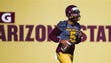 ASU QB Manny Wilkins runs with the ball during practice,