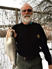 Alan Franchot of Richmond caught a record cisco, also