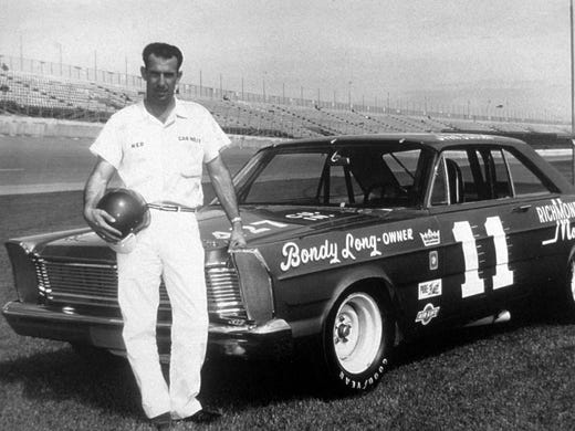 Ned Jarrett, posing with his 1965 Ford, won two championships