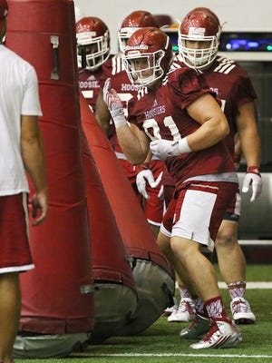 Jacob Robinson (91) runs a defensive drill during Indiana University football practice at John Mellencamp Pavilion, Bloomington, Ind., August 15, 2016.
