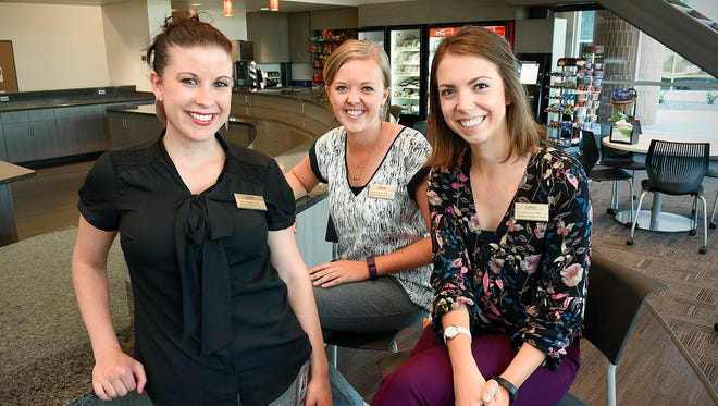 Coborn's supermarket registered dietitians Ashley Kibutha, left to right, Amy Peick and Emily Parent talk Tuesday, Aug. 9. Parent and Peick were just hired and will work in Coborn's stores toward the Twin Cities.