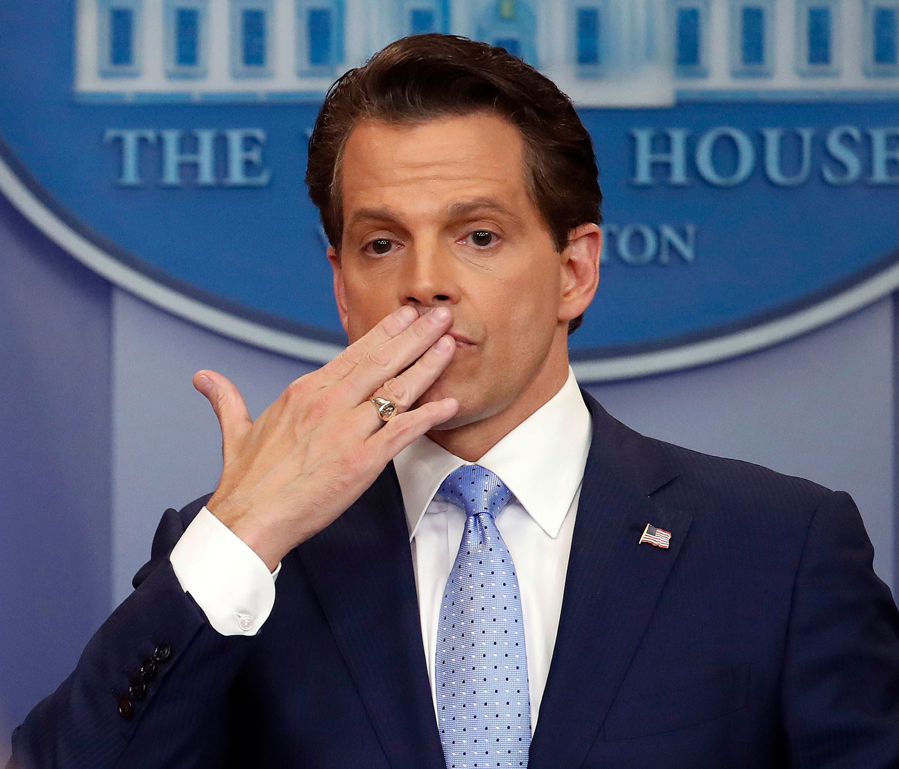 In this July 21, 2017 photo, incoming White House communications director Anthony Scaramucci, blowis a kiss after answering questions during the press briefing in the Brady Press Briefing room of the White House in Washington.